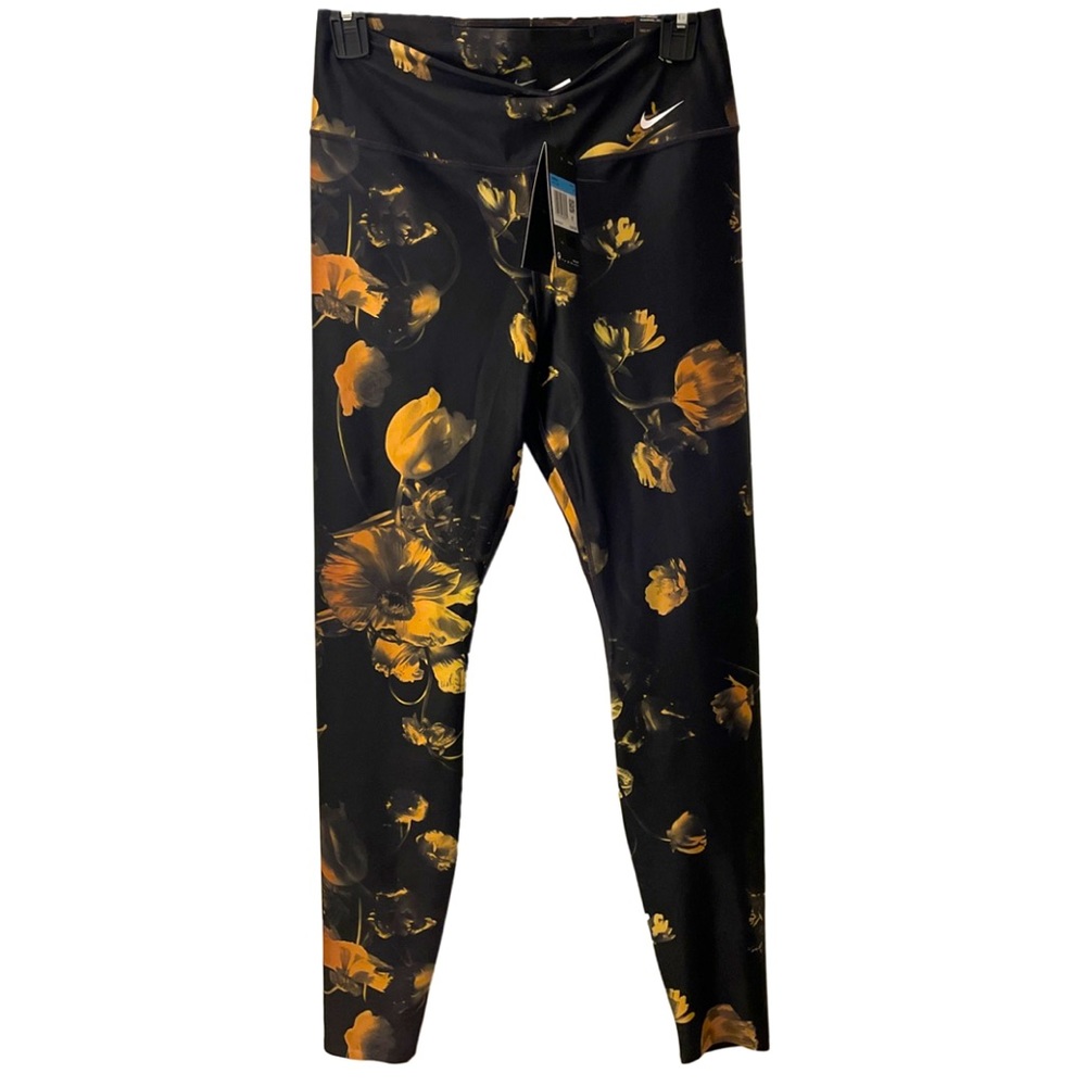 Nike Dry Fit black and yellow/gold floral leggings.